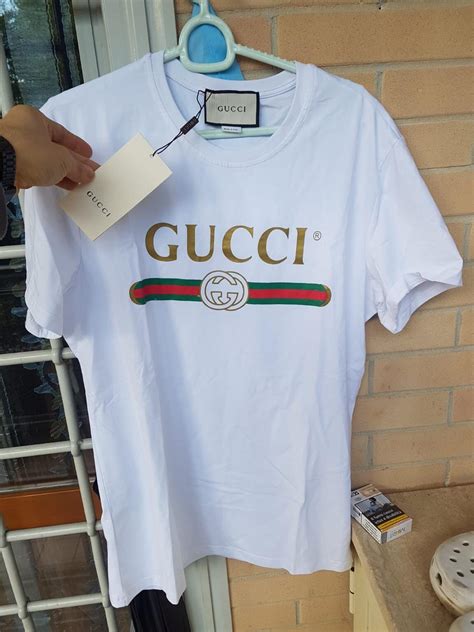 prezzi maglia bianca gucci con strisce rosse verdi orizzontali|Gucci.